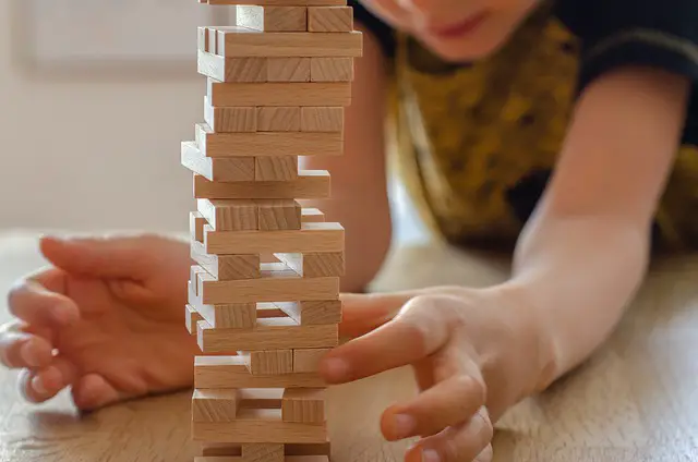 Taking the risk of not updating PHP in WordPress is like playing Jenga