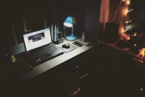 Computer in dark room